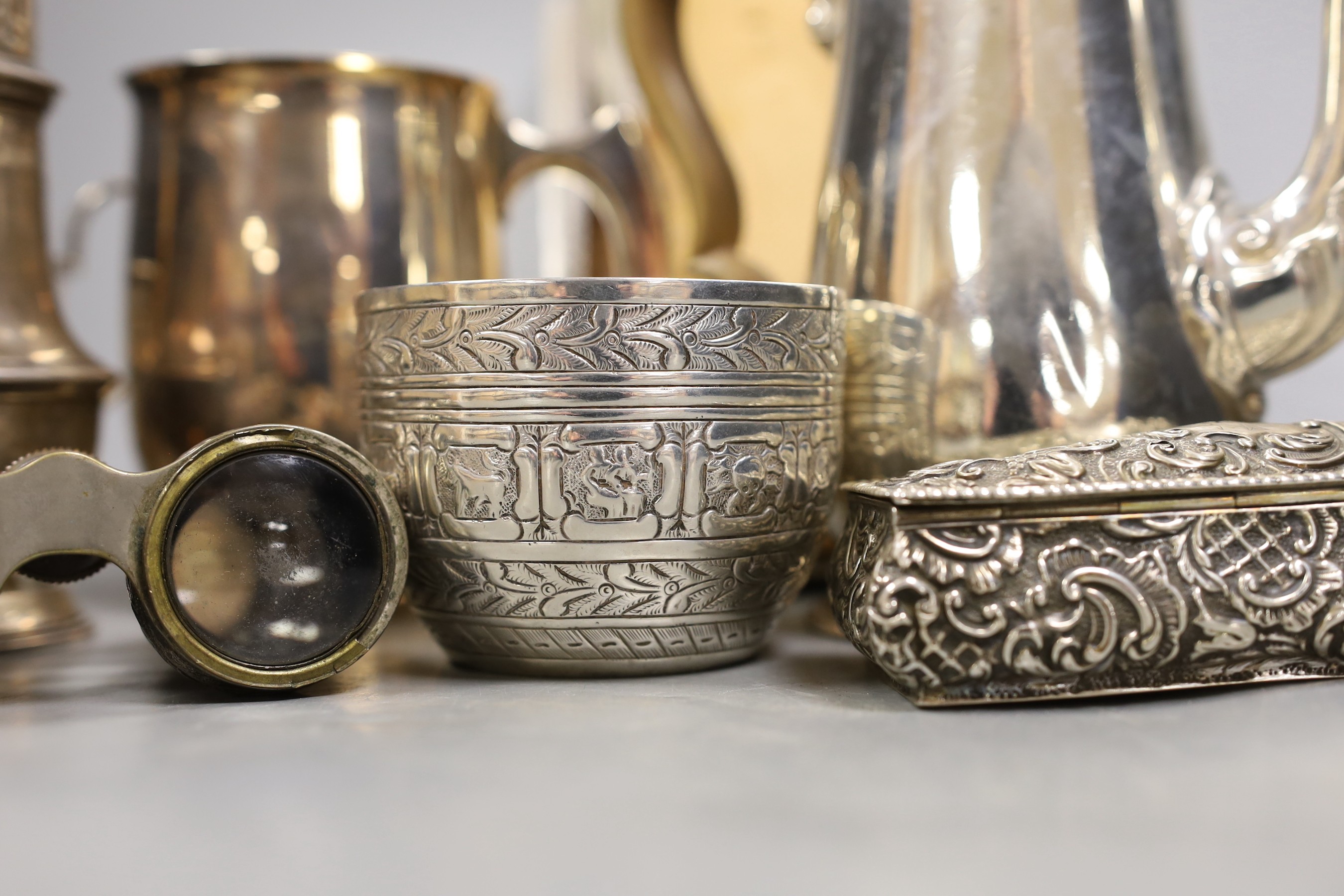 A George V silver coffee pot, London, Carrington & Co 1933, an earlier silver mug by Elkington & Co, a silver sugar caster, cream jug and sugar bowl, a repousse box, pair of silver mounted opera glasses and two plated fr